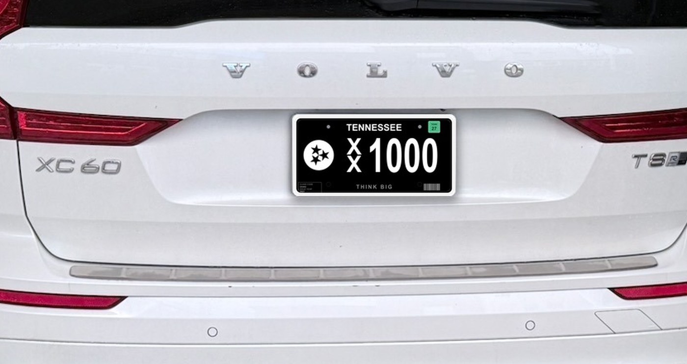 The Drive Tennessee Forward specialty plate mounted on the back of a white SUV